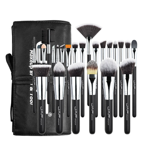 Set of makeup brushes with a black carrying case on a white background