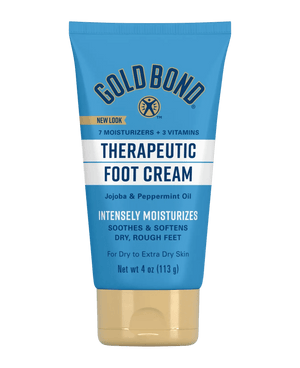 Gold Bond Therapeutic Foot Cream tube on a green background