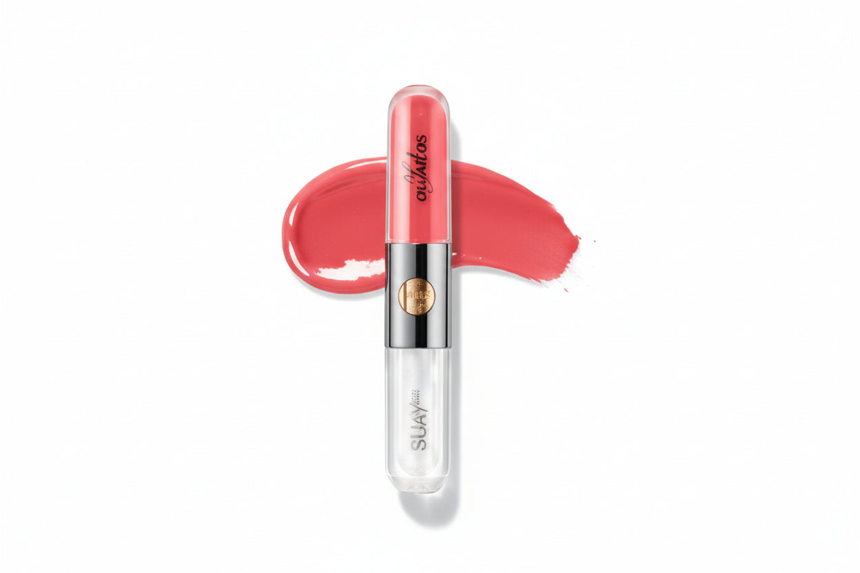 Red lipstick with applicator on a white background