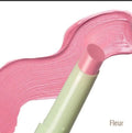 Pink lip balm with visible brand name on a white background