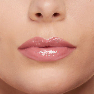 Close-up of a person's lips with a soft focus on the skin around.