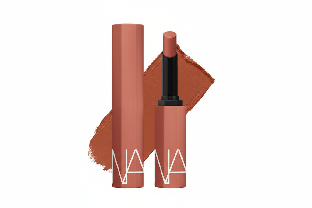 Red cylindrical tool with a black handle on a white background