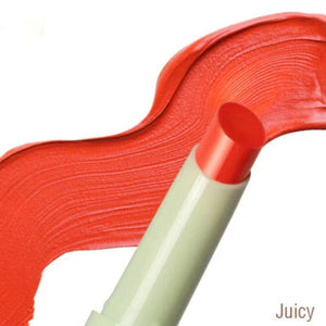 Close-up of a red lipstick with a beige casing on a white background
