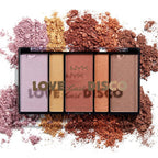 Makeup palette with crushed powder on a white background, featuring the NYX brand.