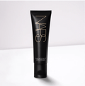 NARS cosmetic tube on a white background