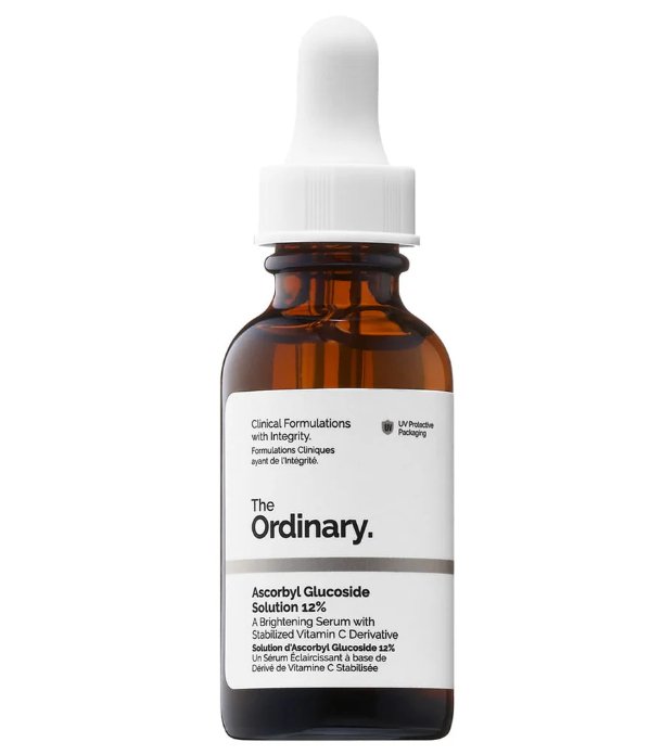 Bottle of 'The Ordinary' serum with a white cap on a white background