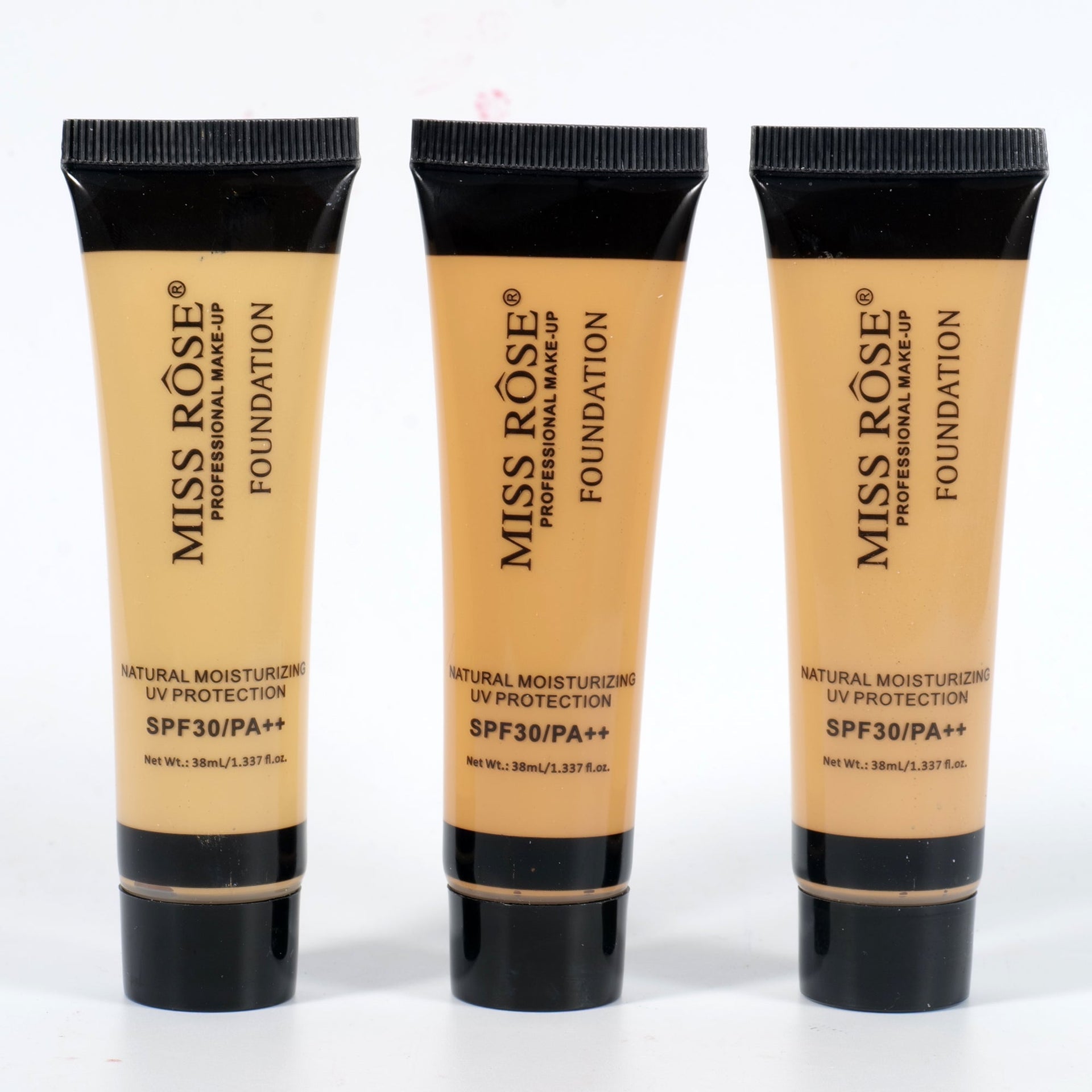 Three tubes of Miss Rose foundation on a white background