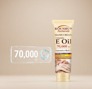 Hand cream tube with vitamin E oil on a beige background