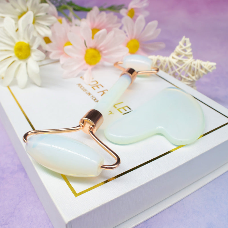 Roller tool and face mask on a white box with flowers in the background