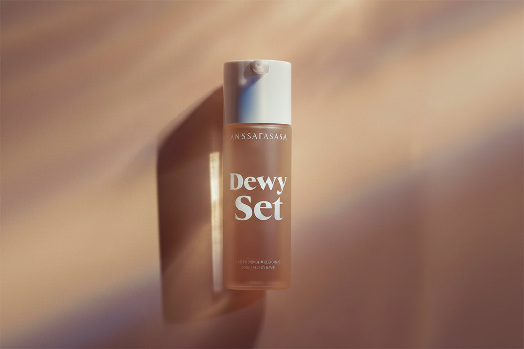 Anastasia Beverly Hills Dewy Set setting spray on a brown background