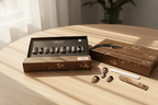 Fudde dental product packaging on a wooden surface with a blurred background
