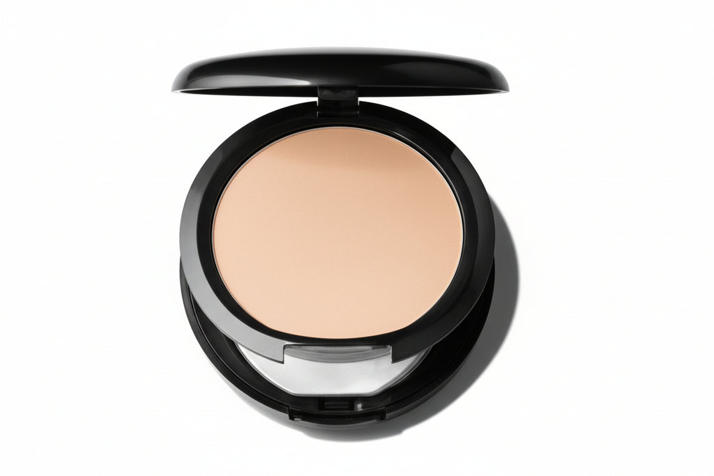 Compact powder in a black case on a white background