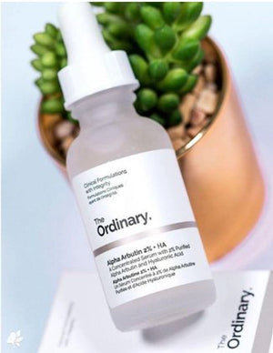 The Ordinary skincare bottle with a dropper on a light background