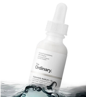 Skincare serum bottle with dropper labeled 'The Ordinary' on a white background