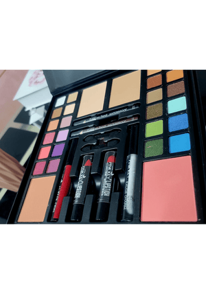 Makeup palette with various colors and tools on a white background