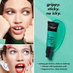 Advertisement for e.l.f. Power Grip Primer with a woman applying makeup and product close-up on a teal background.