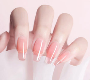 Nails with a gradient color design on a light background